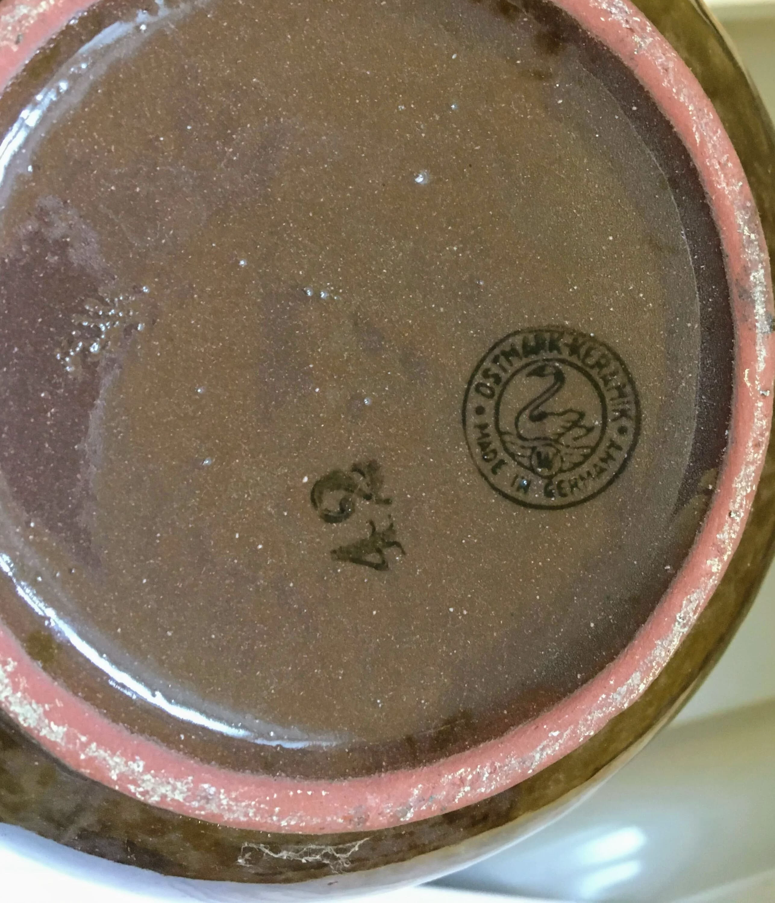 Tekanna, brun med melerade ränder